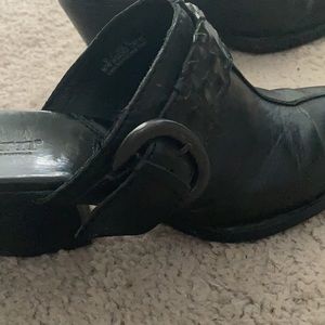 Black Mules.  Leather upper.